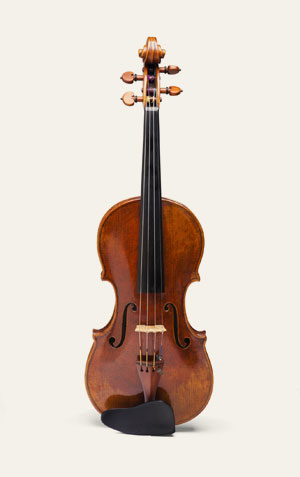 Imagem de um violino, instrumento da família de cordas.